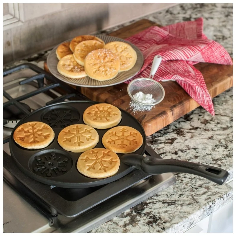 Nordic Ware Cast Aluminum Falling Snowflake Pancake Pan - 7 Cavities Nordic Ware Cast Aluminum Falling Snowflake Pancake Pan - 7 Cavities
