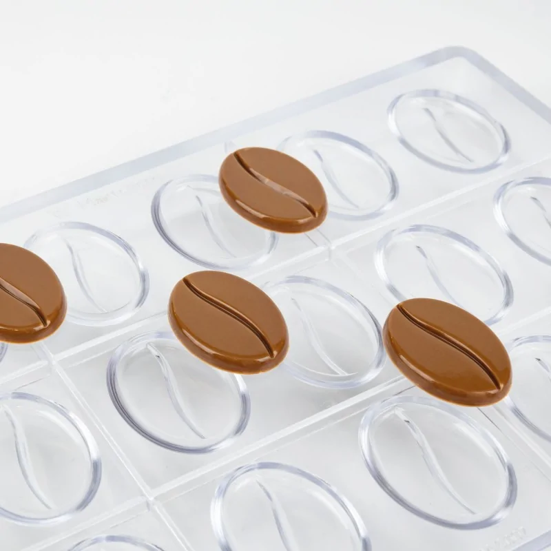 Professional Polycarbonate Coffee Chocolate Napolitain Mold - 40 mm x 28 mm h 4 mm - 4gr - 18 Cavities Professional Polycarbonate Coffee Chocolate Napolitain Mold - 40 mm x 28 mm h 4 mm - 4gr - 18 Cavities